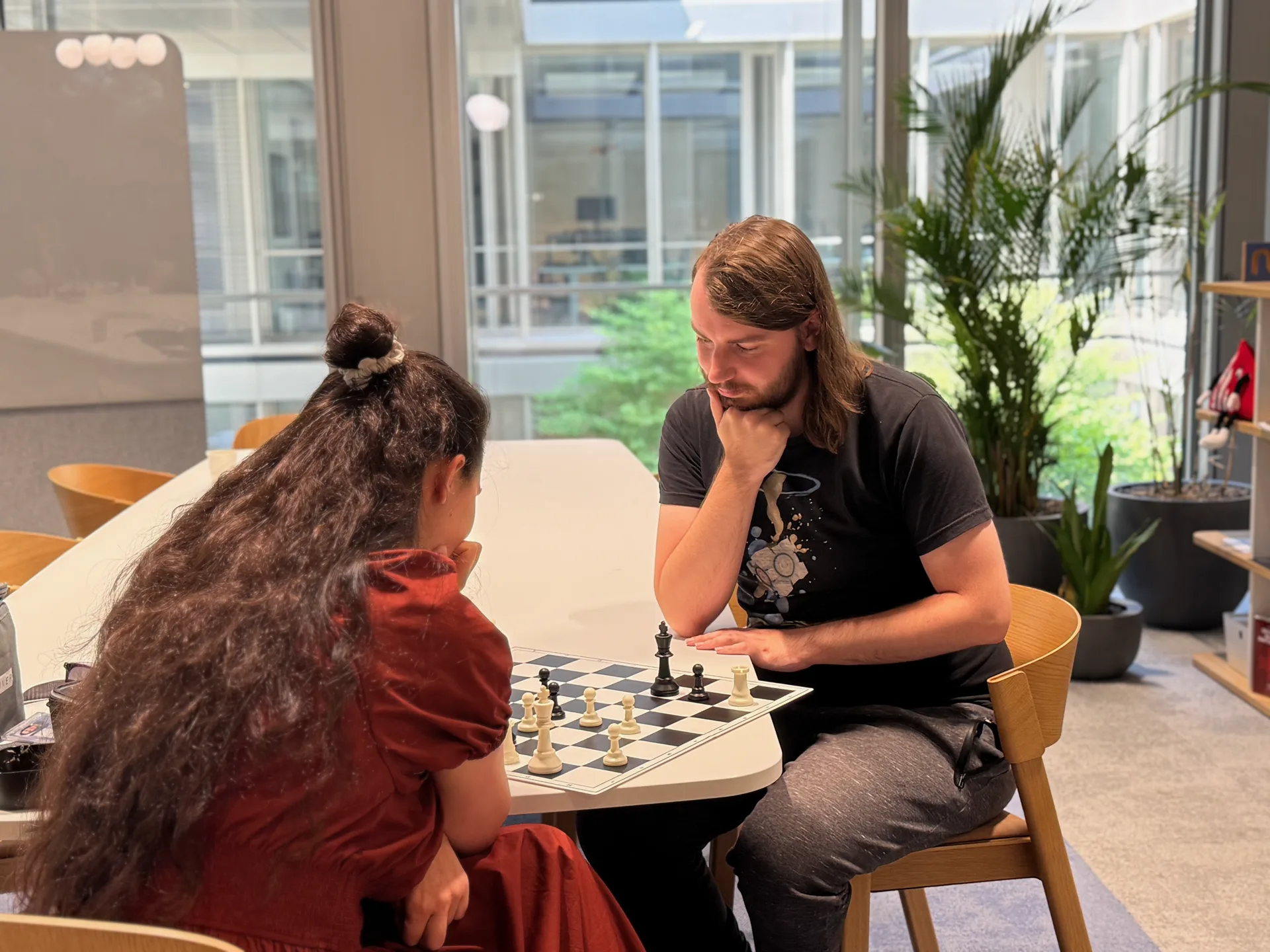 Two team members playing chess